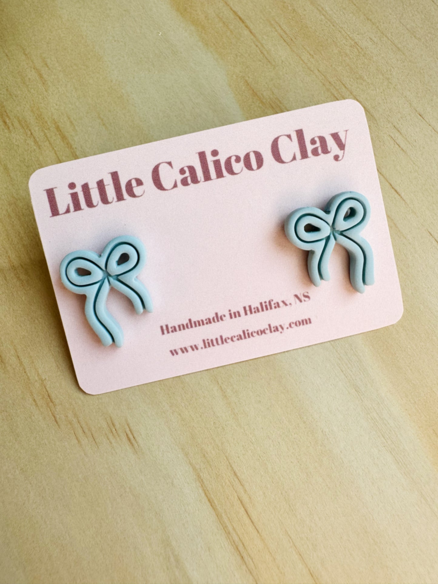 Embossed Bow Studs