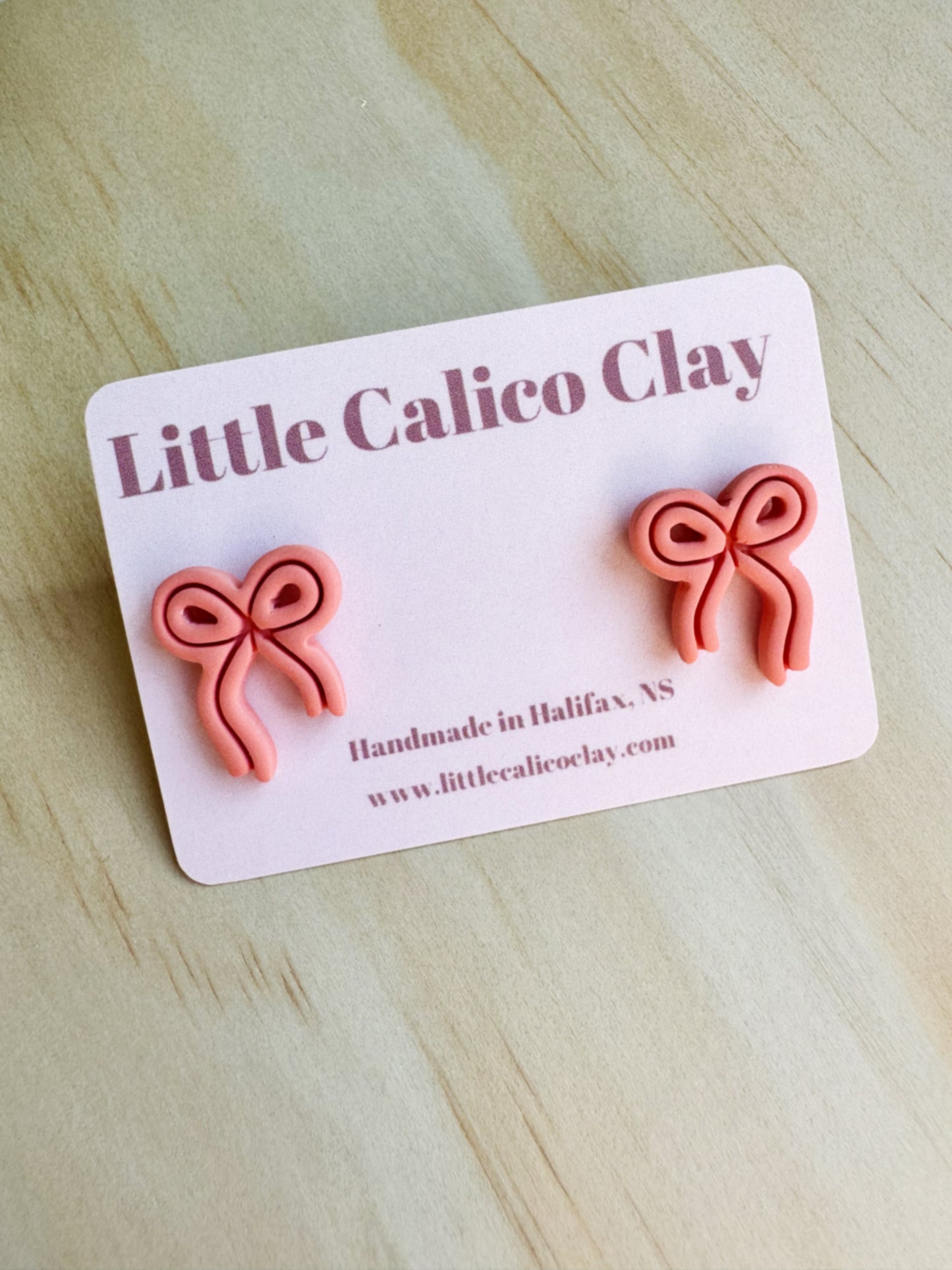 Embossed Bow Studs