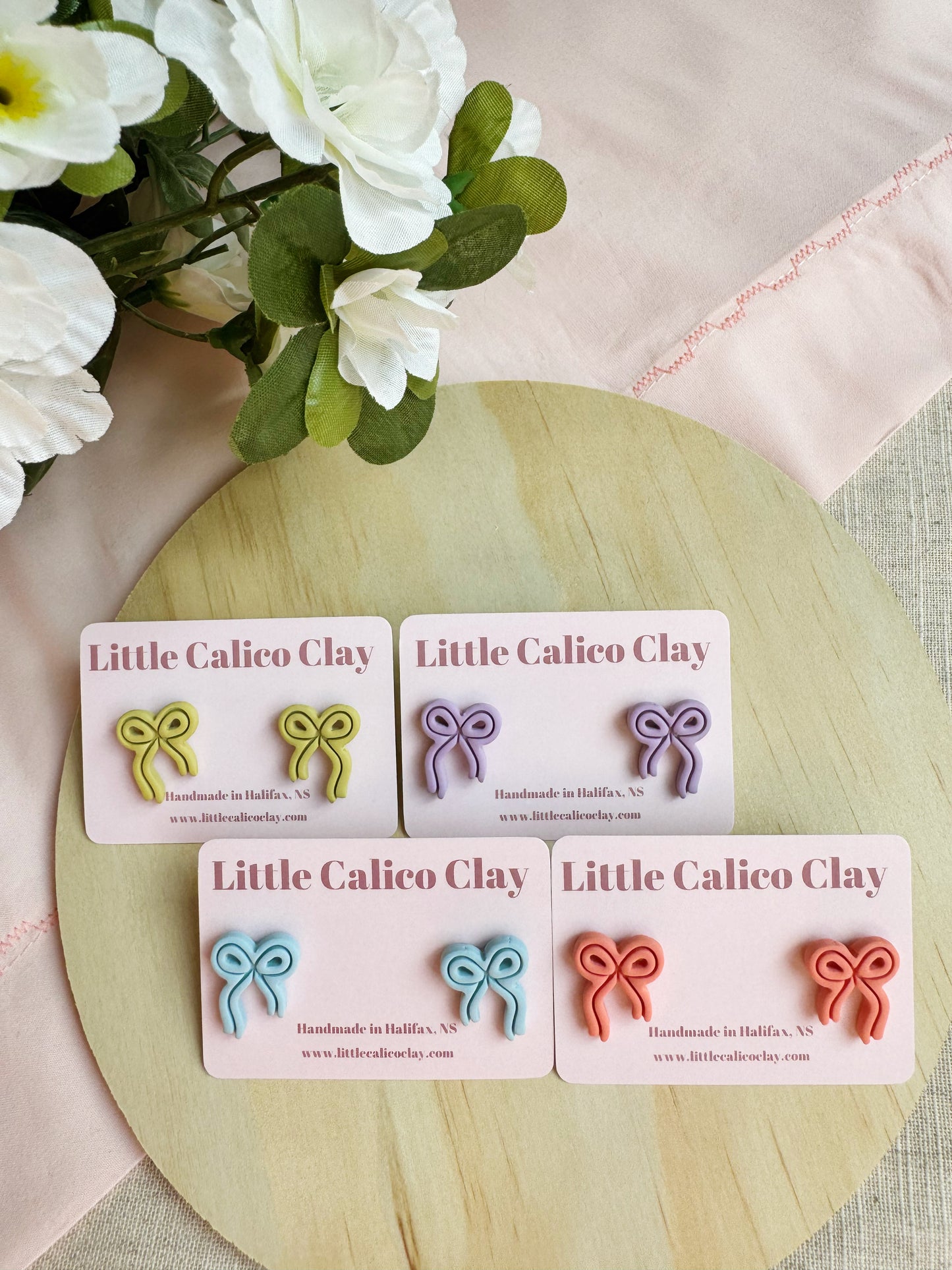 Embossed Bow Studs